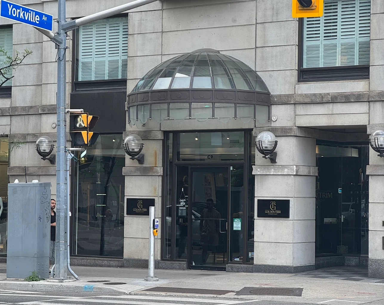Golden Trim storefront on the corner of Avenue Rd and Yorkville Ave